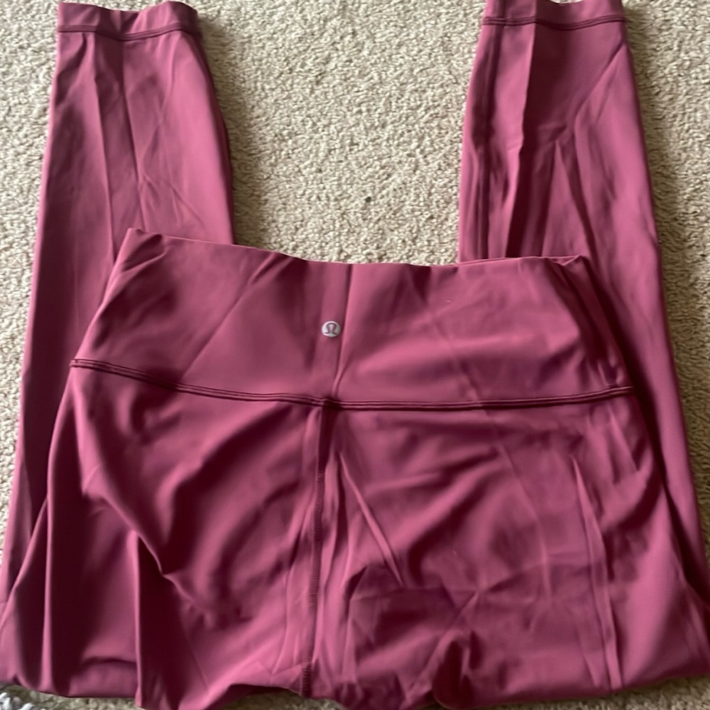 Hardly worn Wunder Under Lulu lemon leggings in a pretty maroon color.